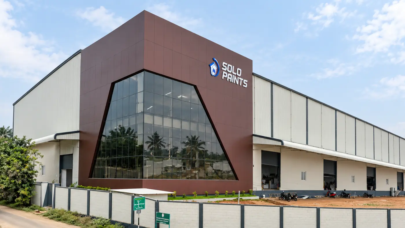 Solo Paints industrial building with a brown glazed entrance block